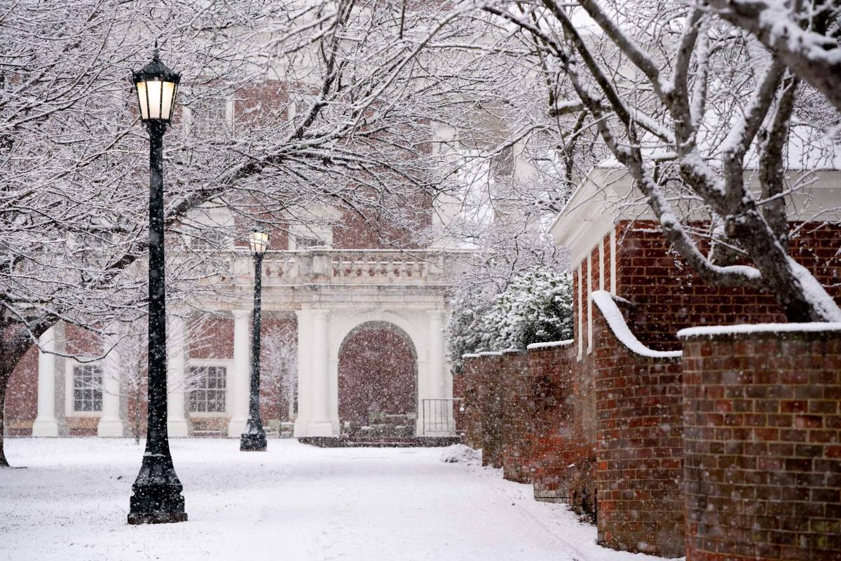 Snow falling and on UVA campus