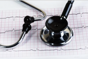 Stethoscope atop an ECG printout