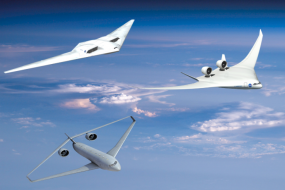 Three futuristic aircraft fly in a cloud filled sky
