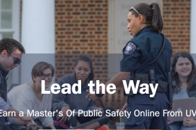 Female in police uniform talking to four sudents